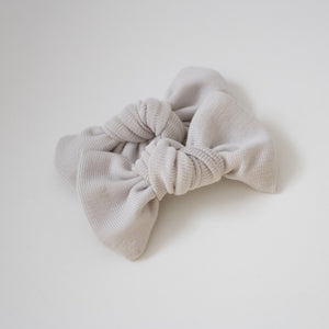 Soft grey knot jersey bows