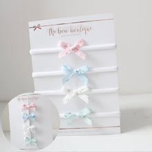 Load image into Gallery viewer, Floral hand tied ribbon bows