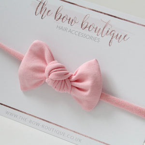 Pink knot jersey bows