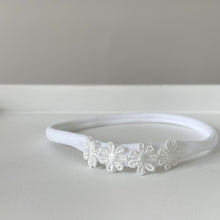 Load image into Gallery viewer, White delicate daisy flowers - Clip or headband.