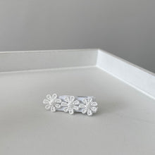 Load image into Gallery viewer, White delicate daisy flowers - Clip or headband.