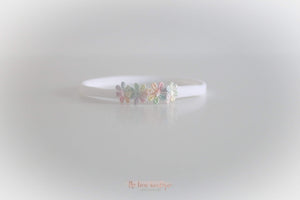 Delicate rainbow daisy flowers - Clip or headband