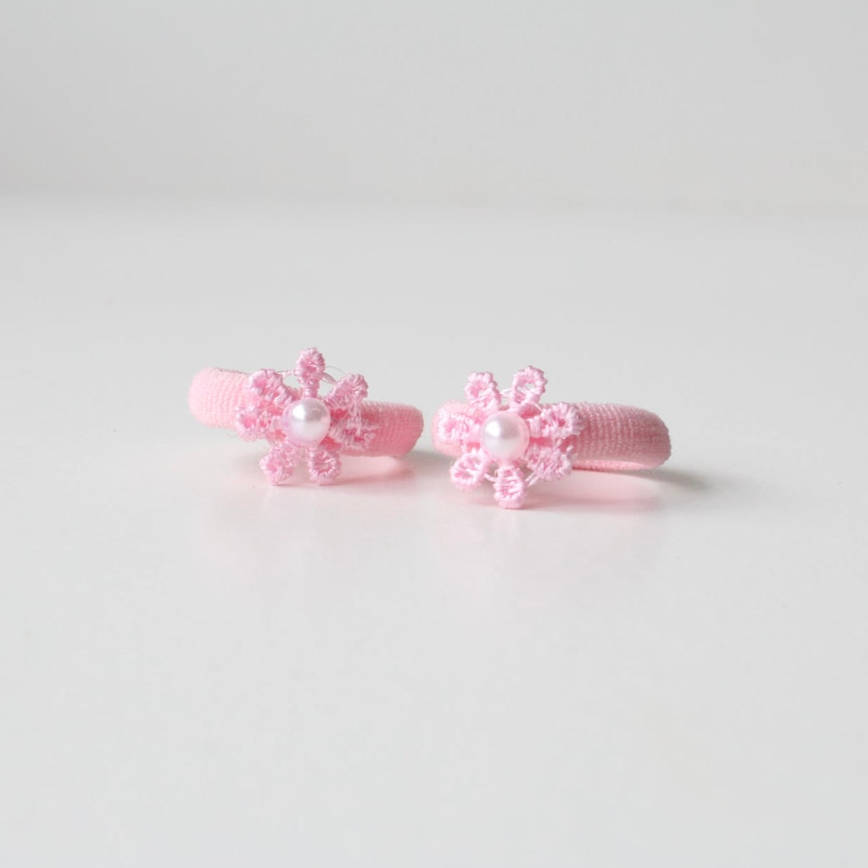 My first pink delicate pigtail bobbles