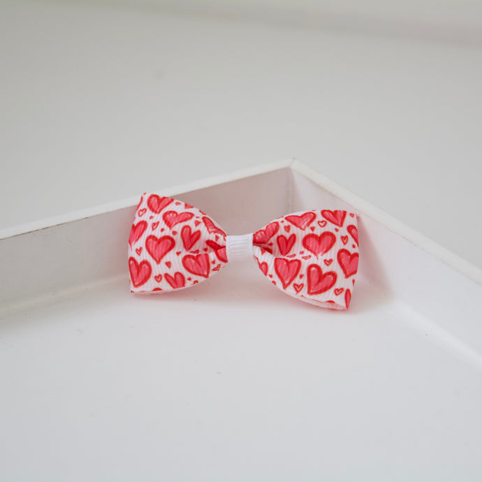 Heart ribbon pinch bows