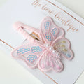 Light pink iridescent butterfly snappy clip
