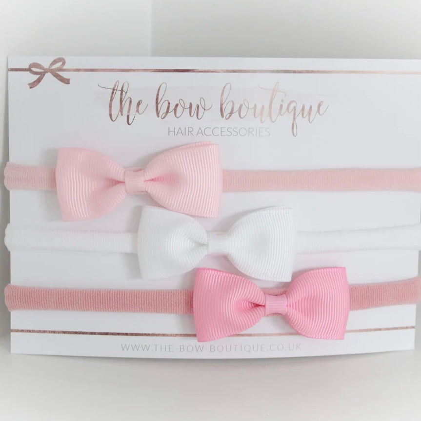 The pink pinch bow headband set