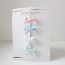 Load image into Gallery viewer, Floral hand tied ribbon bows