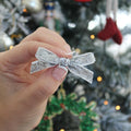 Silver hand tied glitter bow | Clip or headband