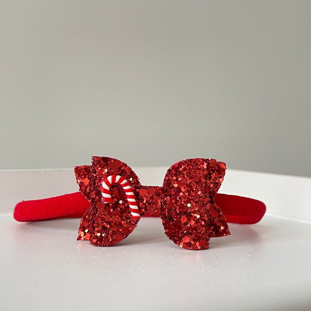 Red & white candy cane bow | Clip or headband
