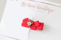 My first christmas bow clips