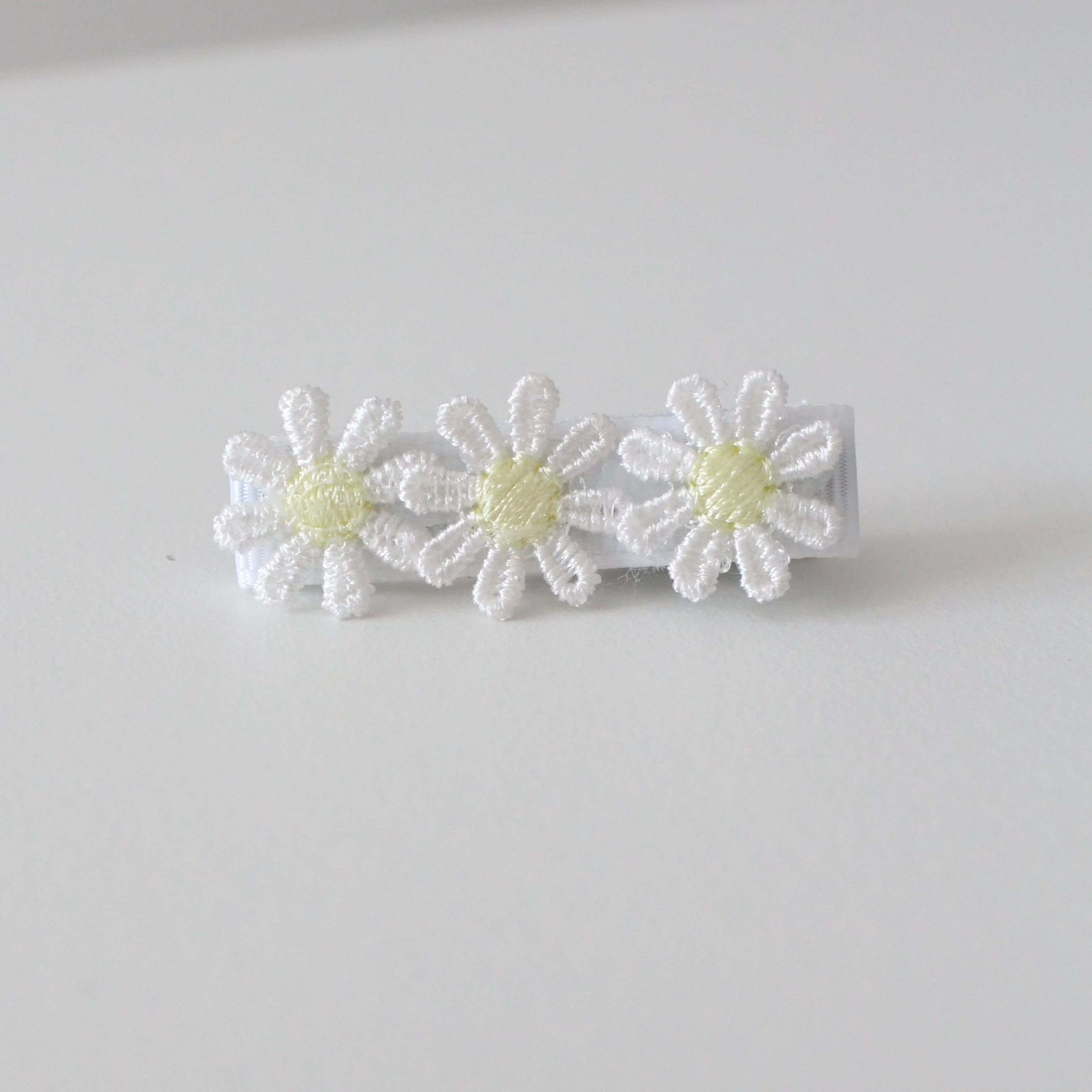 Delicate lemon daisy flowers | Clip or headband