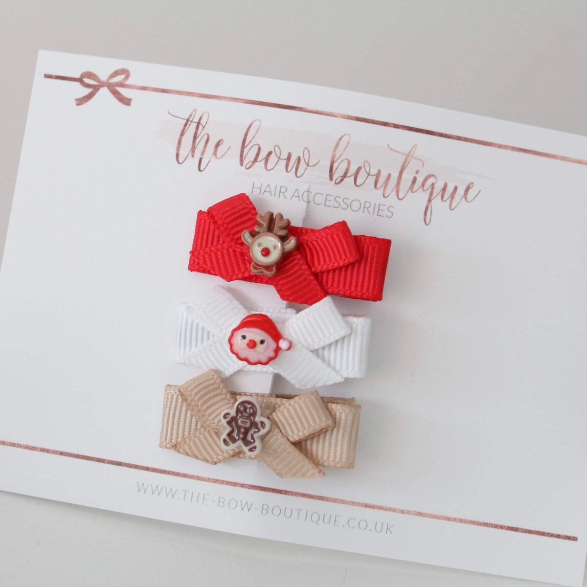 My first christmas bow clips