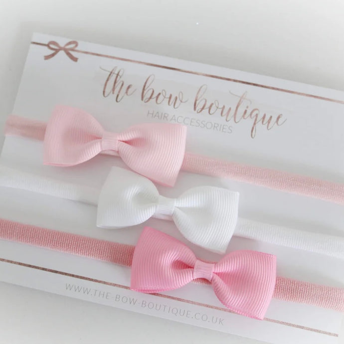 The pinks pinch bow headband set