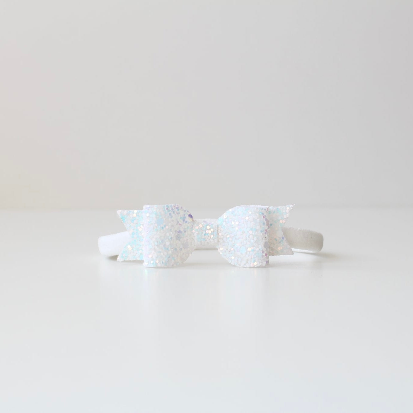 Small glitter bows | 22 Colours | Clip or headband