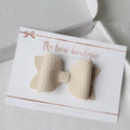 Nude leather look bows