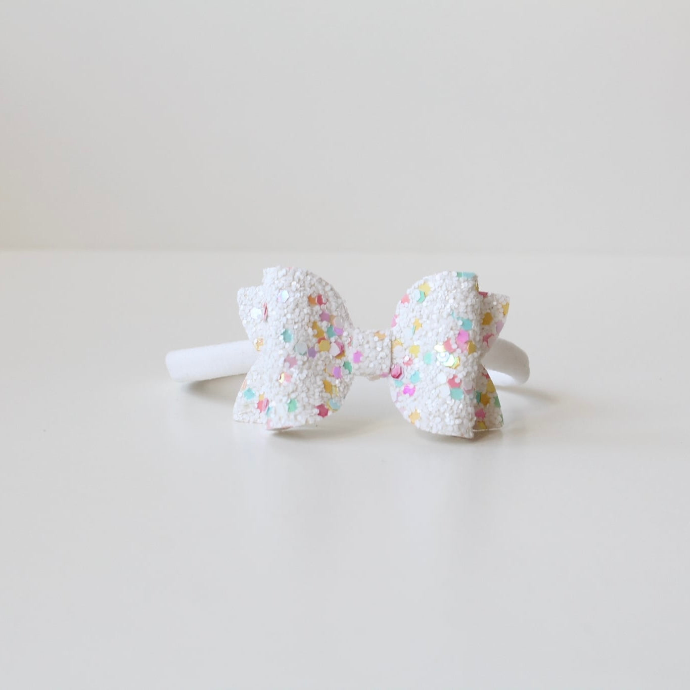 Medium deluxe glitter bows | 20 Colours | Clip or headband