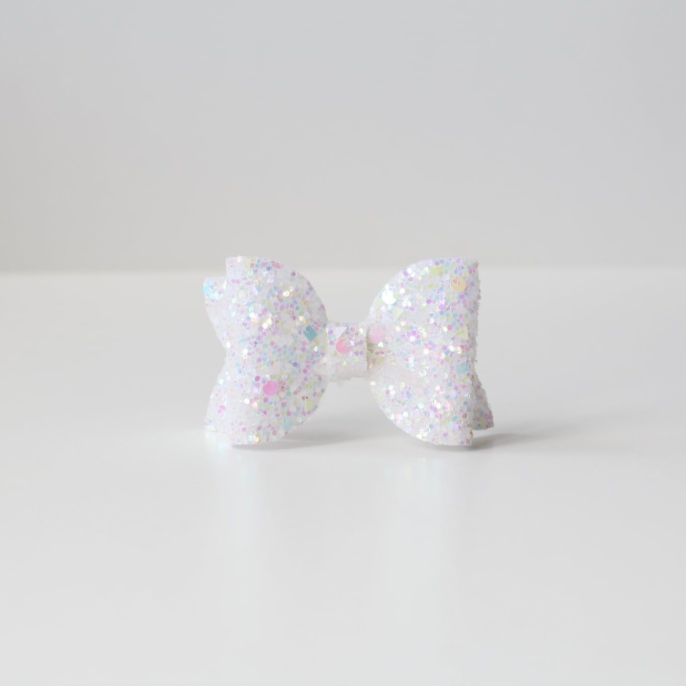 Medium deluxe glitter bows | 20 Colours | Clip or headband