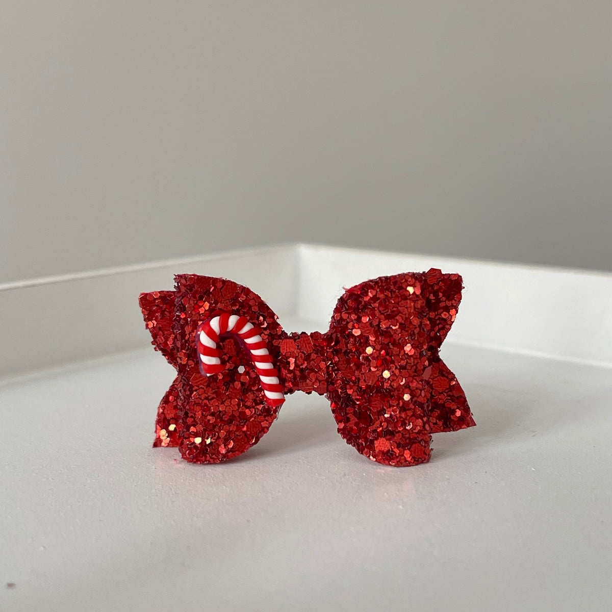 Red & white candy cane bow | Clip or headband