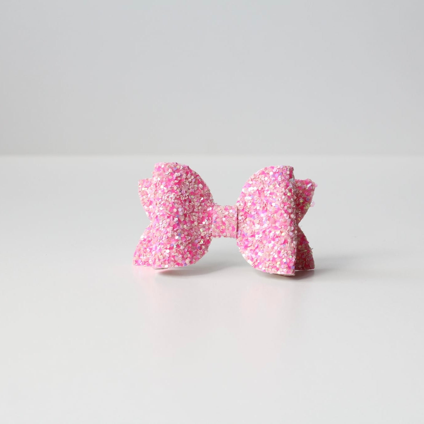 Medium deluxe glitter bows | 20 Colours | Clip or headband