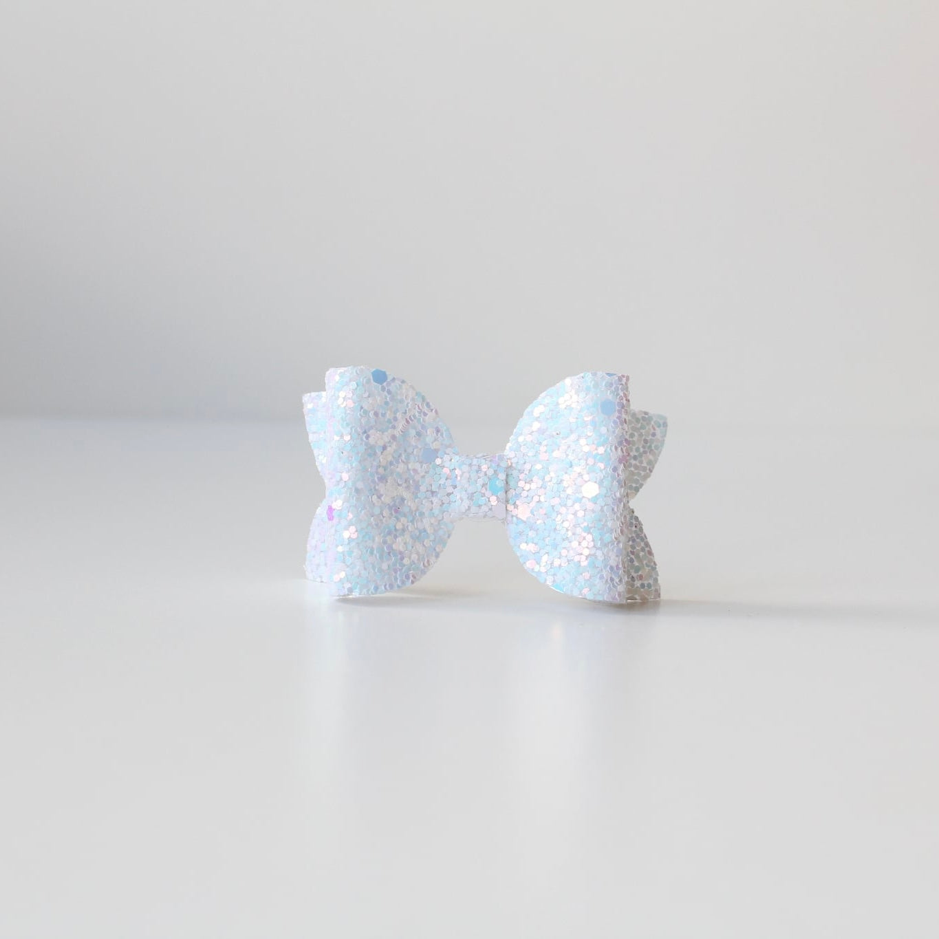 Medium deluxe glitter bows | 20 Colours | Clip or headband