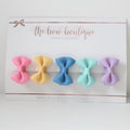 My first holiday mini pinch bows I clips or bobbles