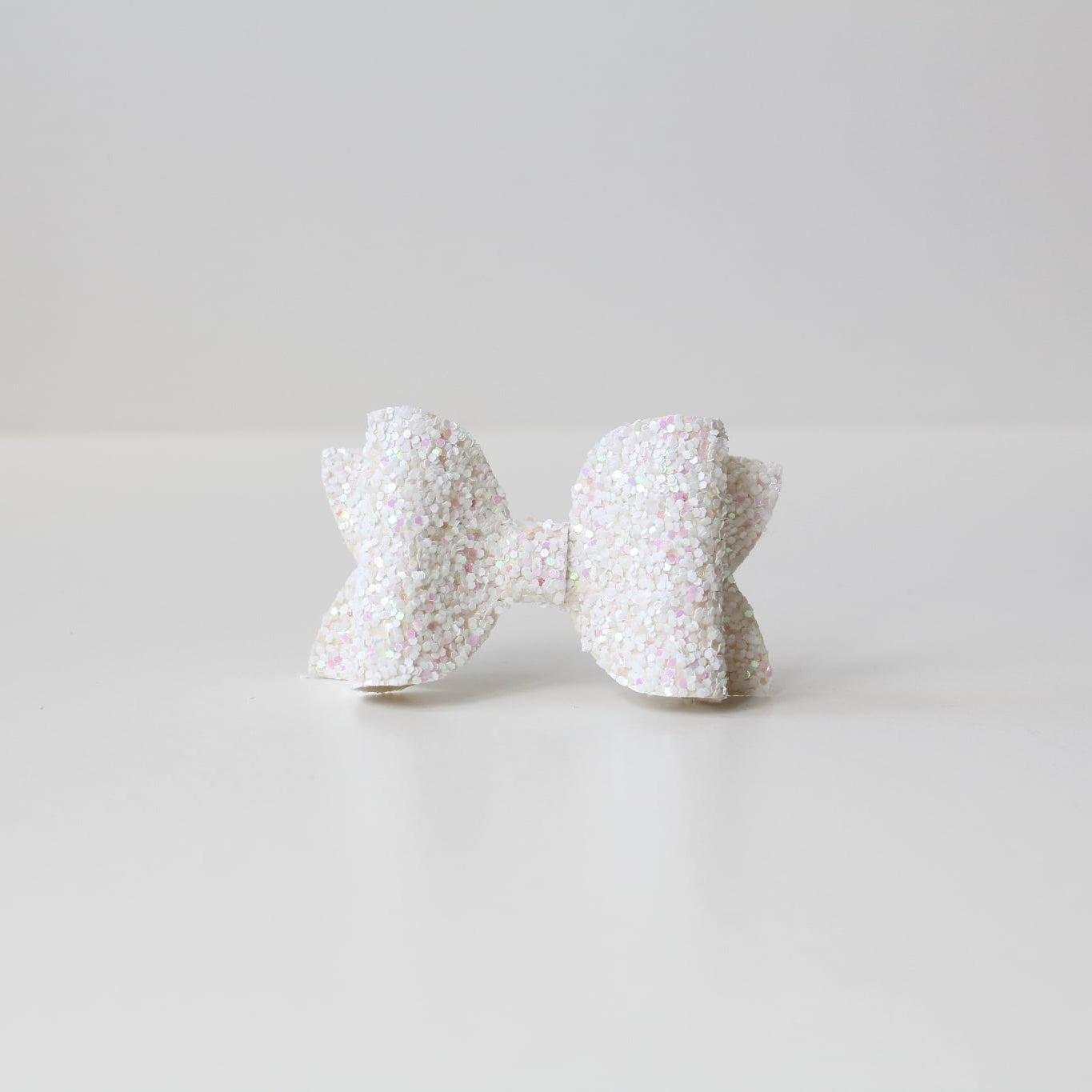 Medium deluxe glitter bows | 20 Colours | Clip or headband