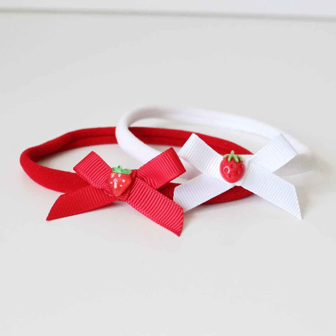 Hand tied strawberry ribbon bow headbands | 2 colours