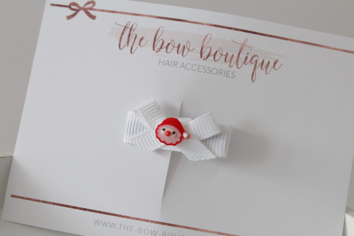 My first christmas bow clips