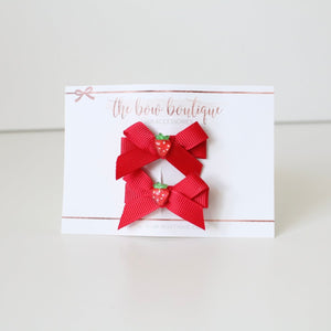 Red hand tied strawberry ribbon bow clip