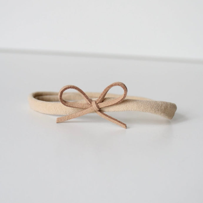 Beige mini suede bow