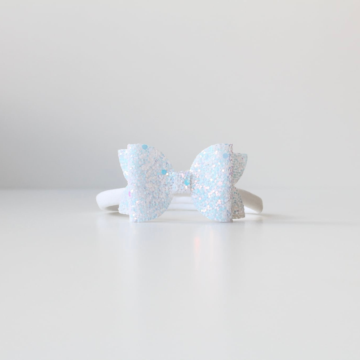 Medium deluxe glitter bows | 20 Colours | Clip or headband