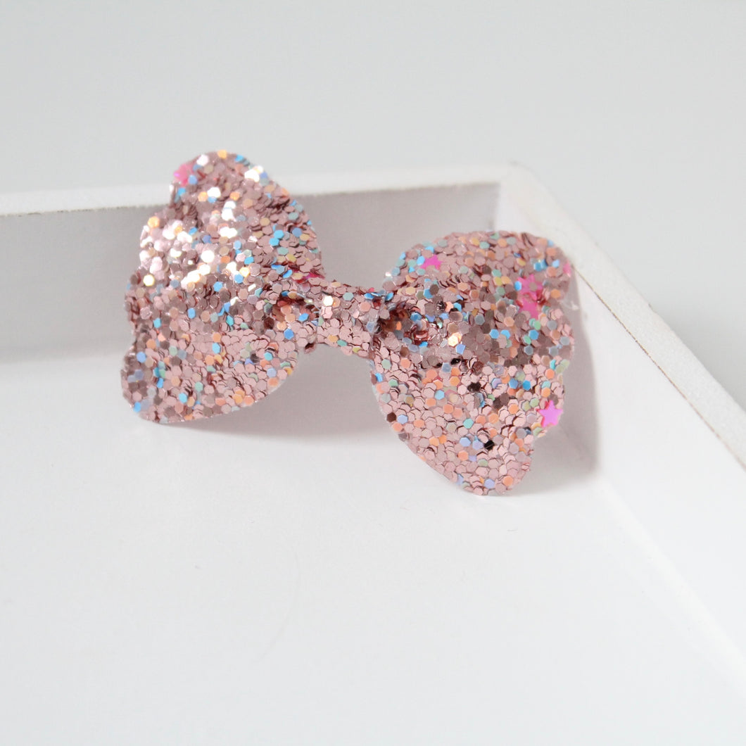 Dusky scalloped glitter bows