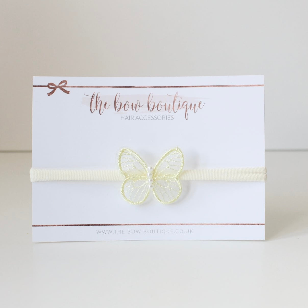Delicate yellow butterfly pearl headband