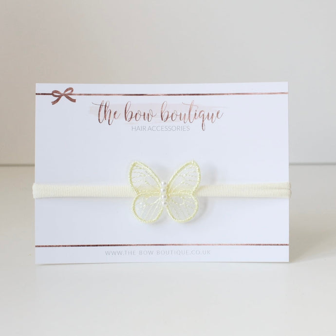 Delicate yellow butterfly pearl headband
