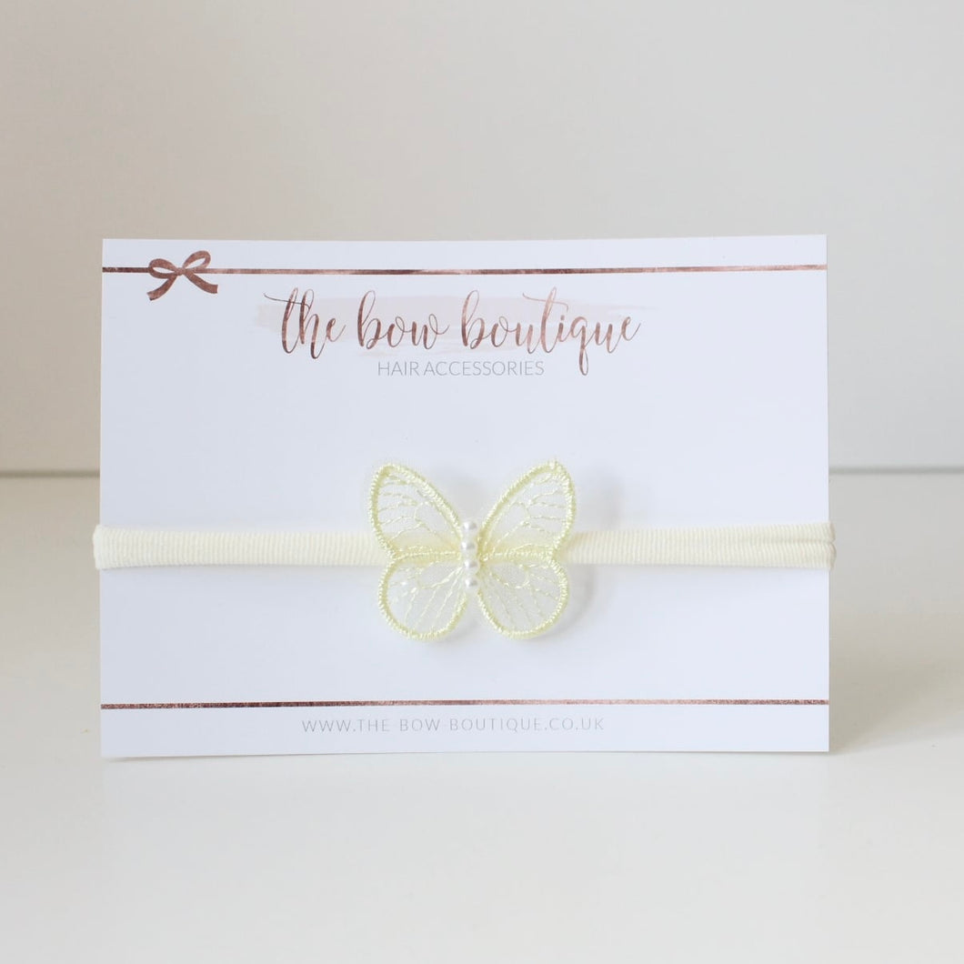 Delicate yellow butterfly pearl headband