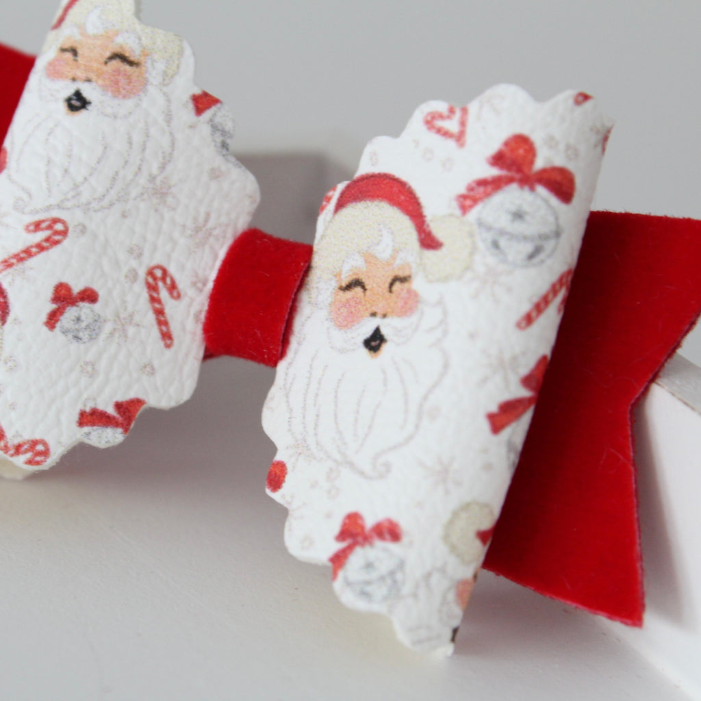 Christmas santa claus bow | Clip or headband
