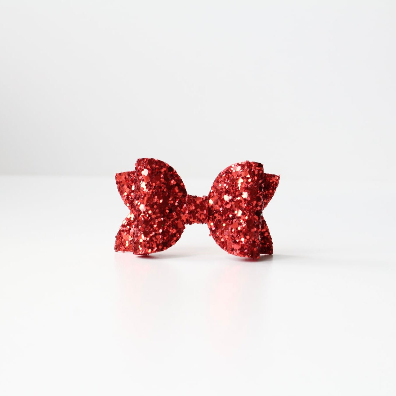 Medium deluxe glitter bows | 20 Colours | Clip or headband