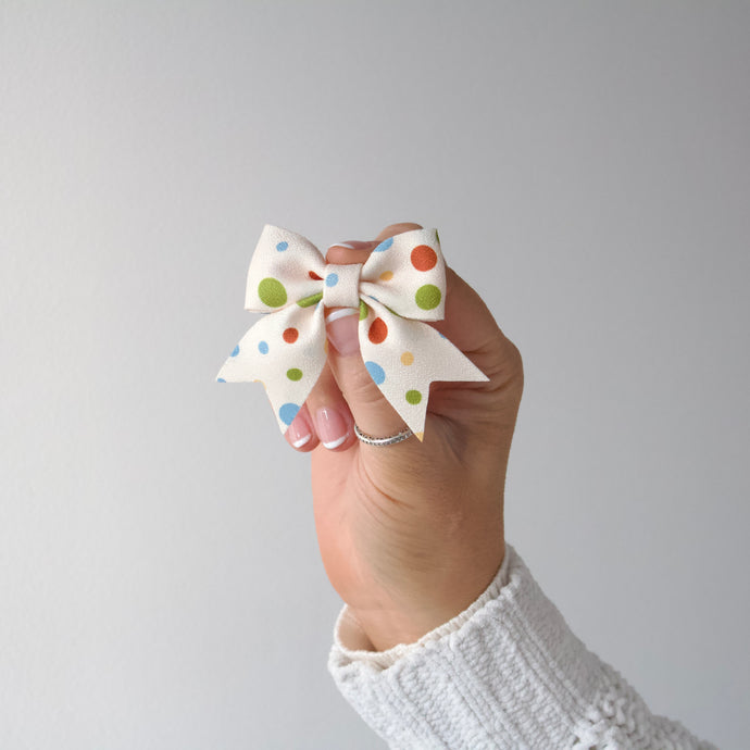Short tail cream polka dot floral bow