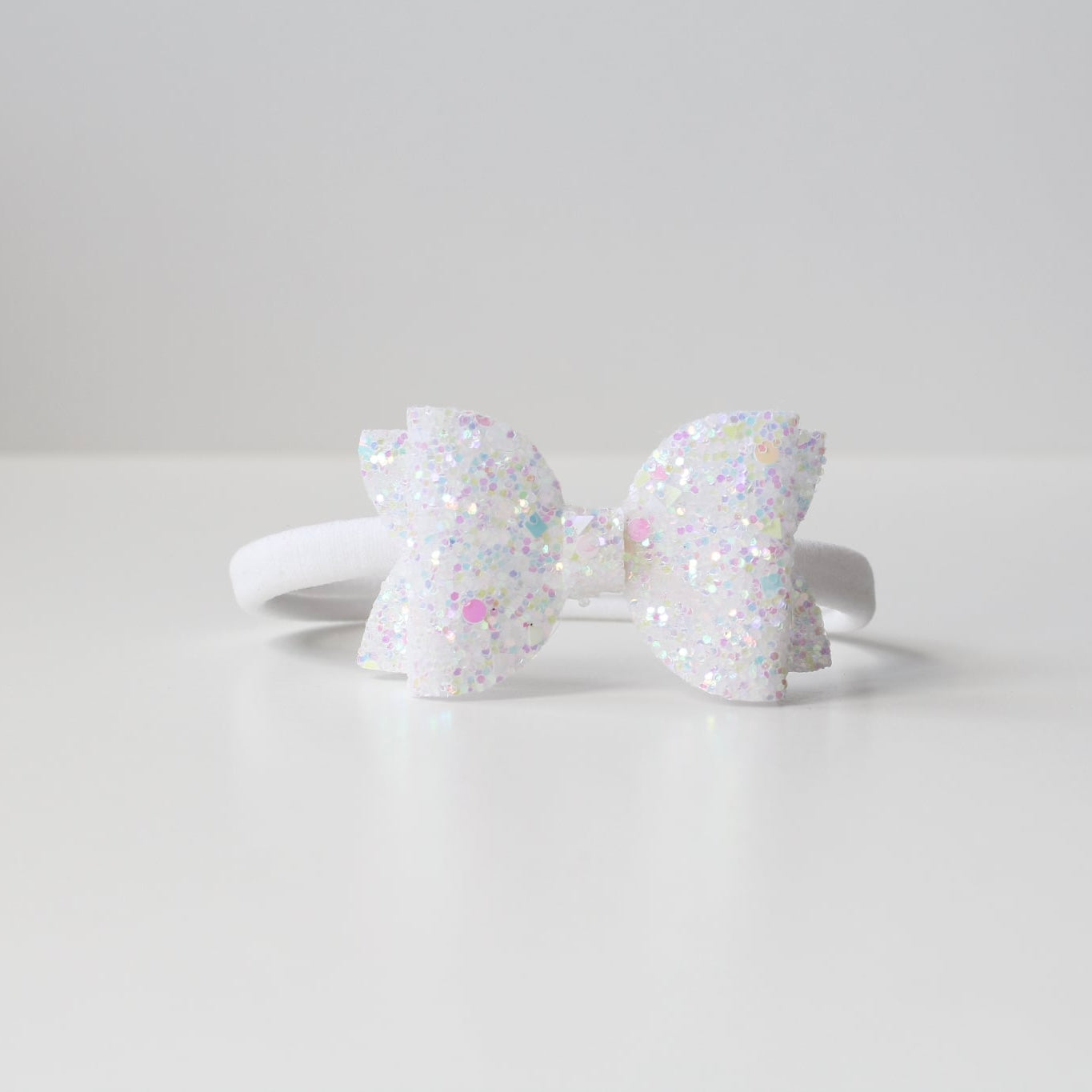 Medium deluxe glitter bows | 20 Colours | Clip or headband