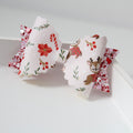 Pinkmas jolly reindeer bow | Clip or headband