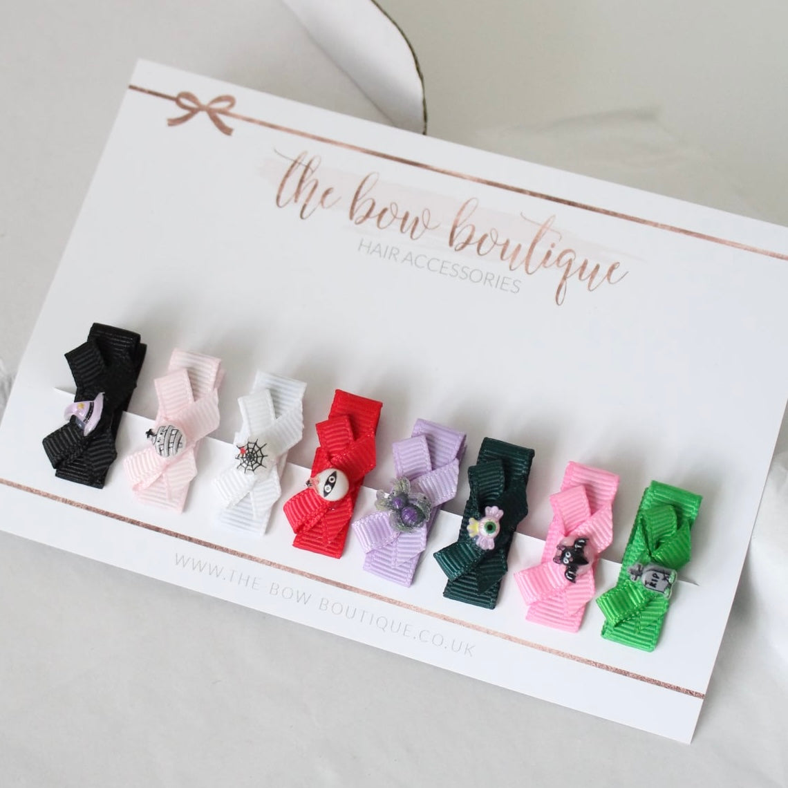 My first ribbon halloween bow clips