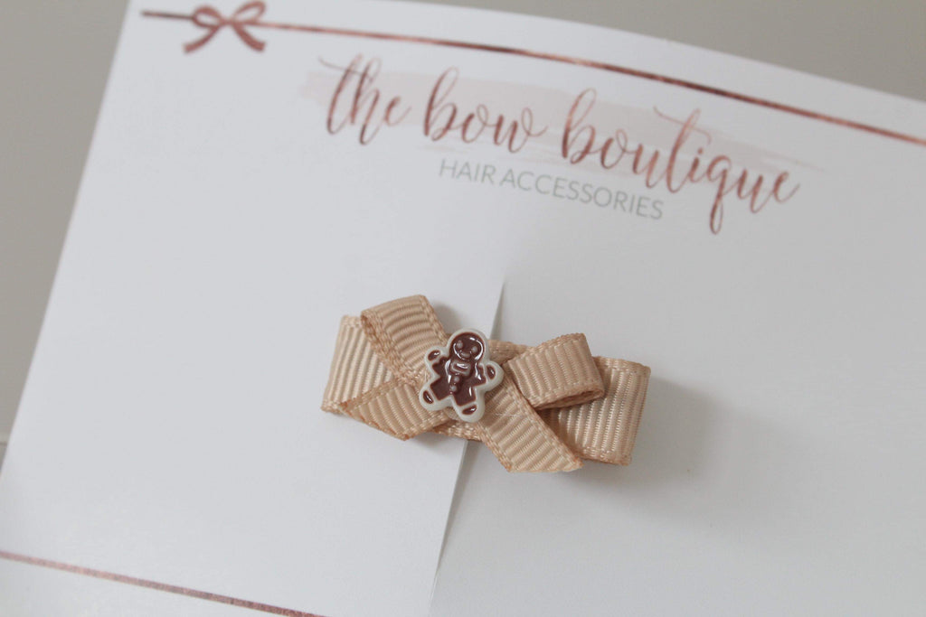 My first christmas bow clips
