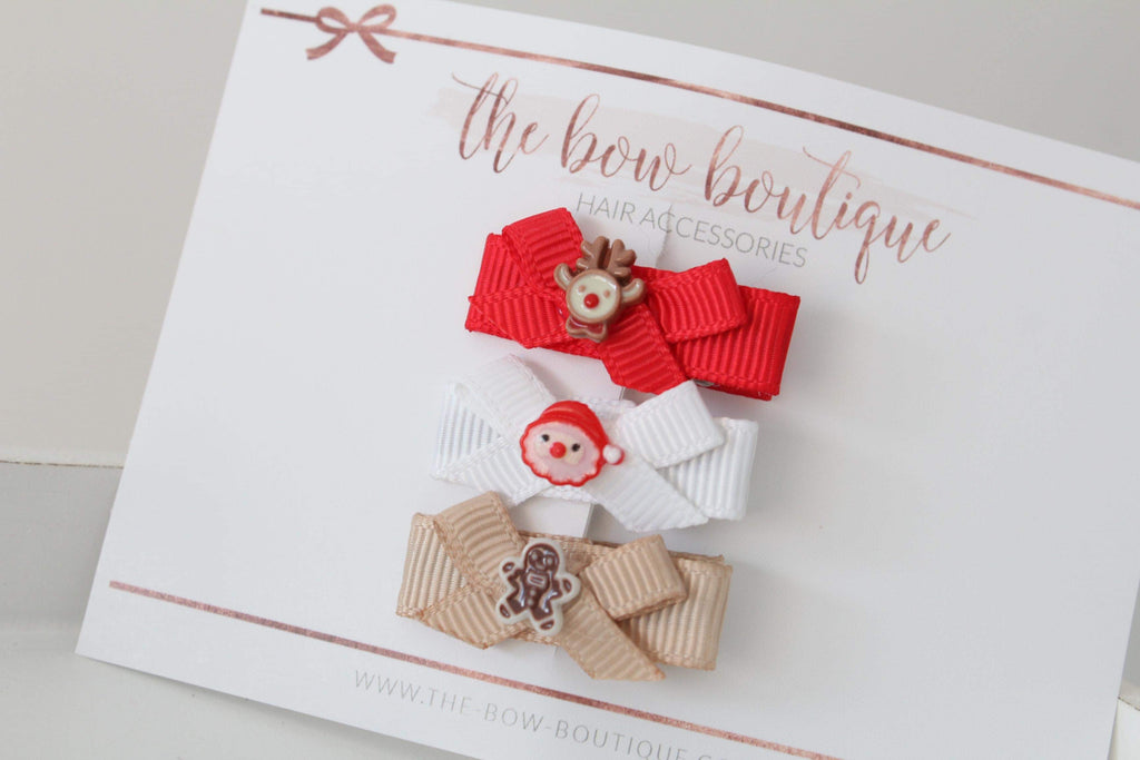 My first christmas bow clips