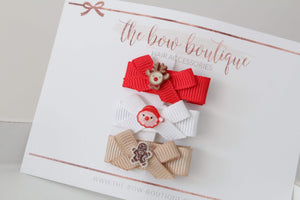My first christmas bows