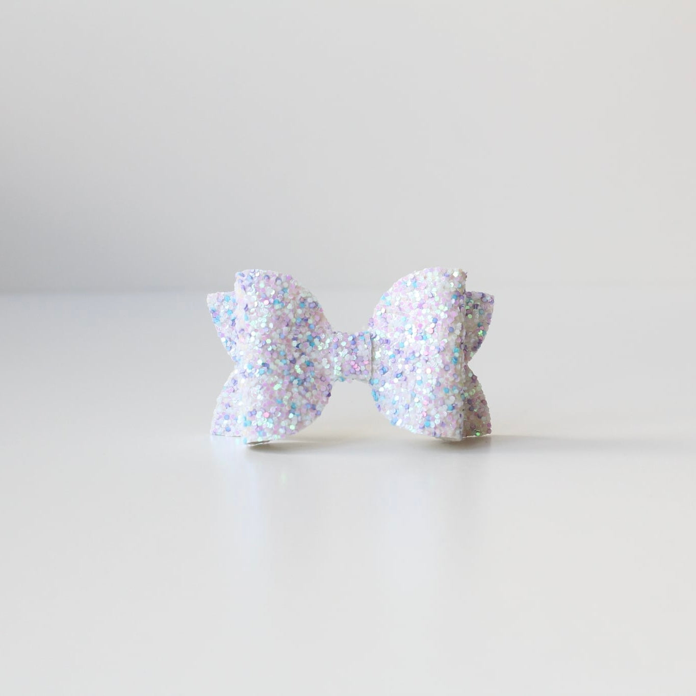 Medium deluxe glitter bows | 20 Colours | Clip or headband