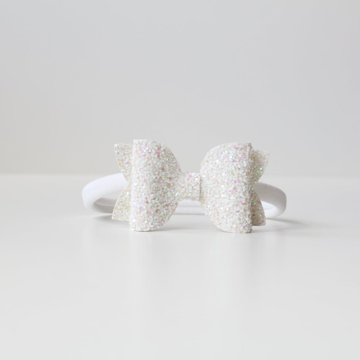 Medium deluxe glitter bows | 20 Colours | Clip or headband