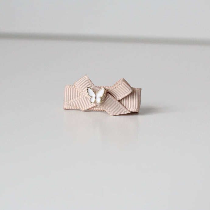 My first beige ribbon butterfly clip