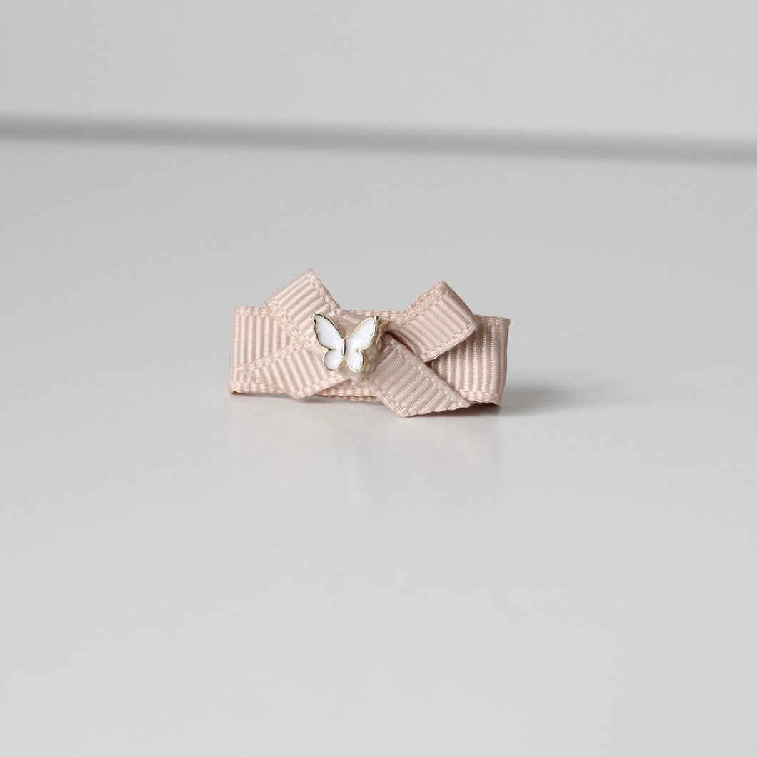 My first beige ribbon butterfly clip