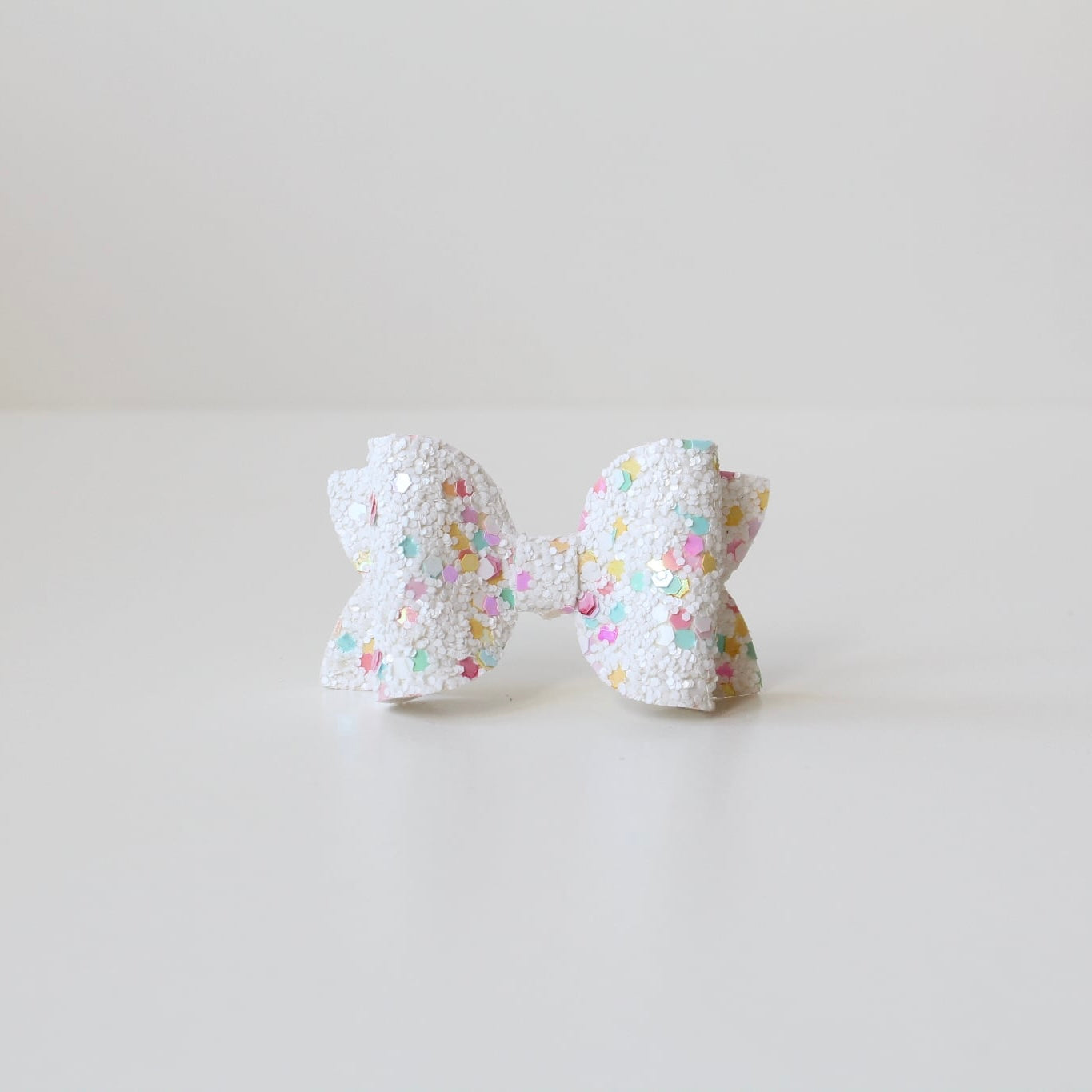 Medium deluxe glitter bows | 20 Colours | Clip or headband
