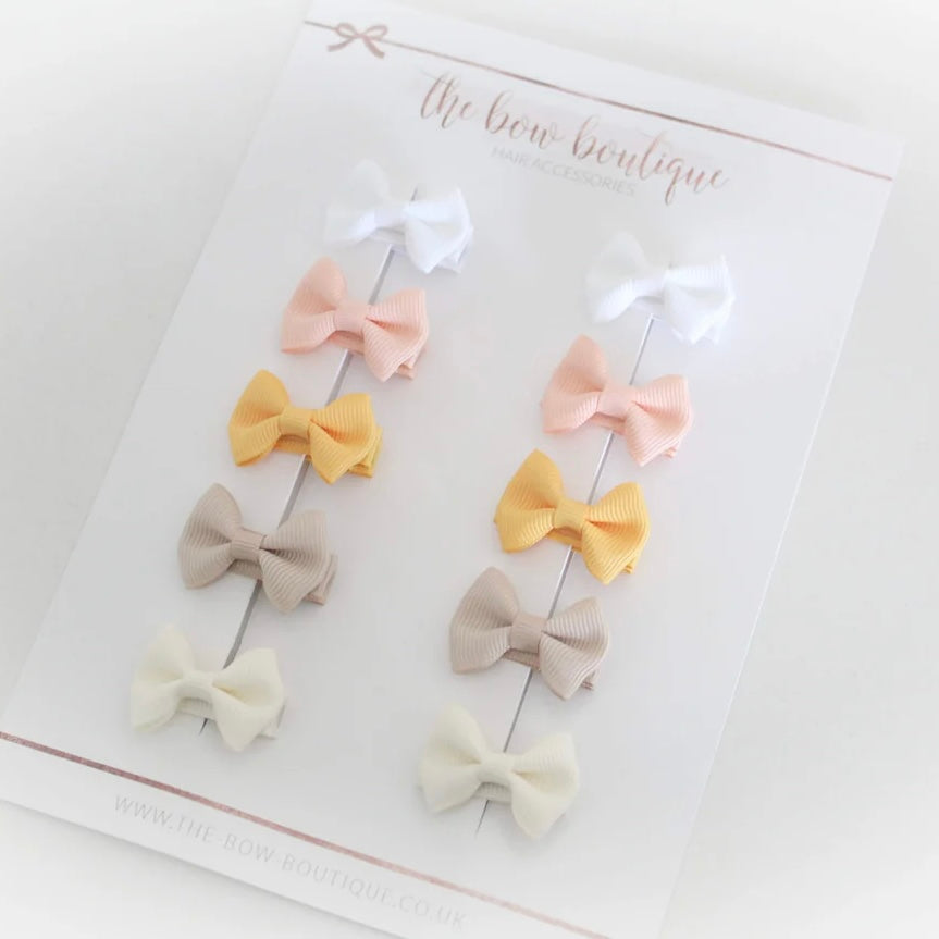 My first sunset mini pinch bows | clips or bobbles